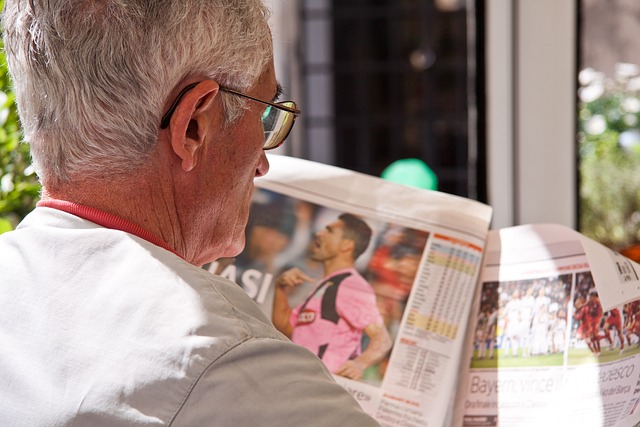 Picture of a news paper reader